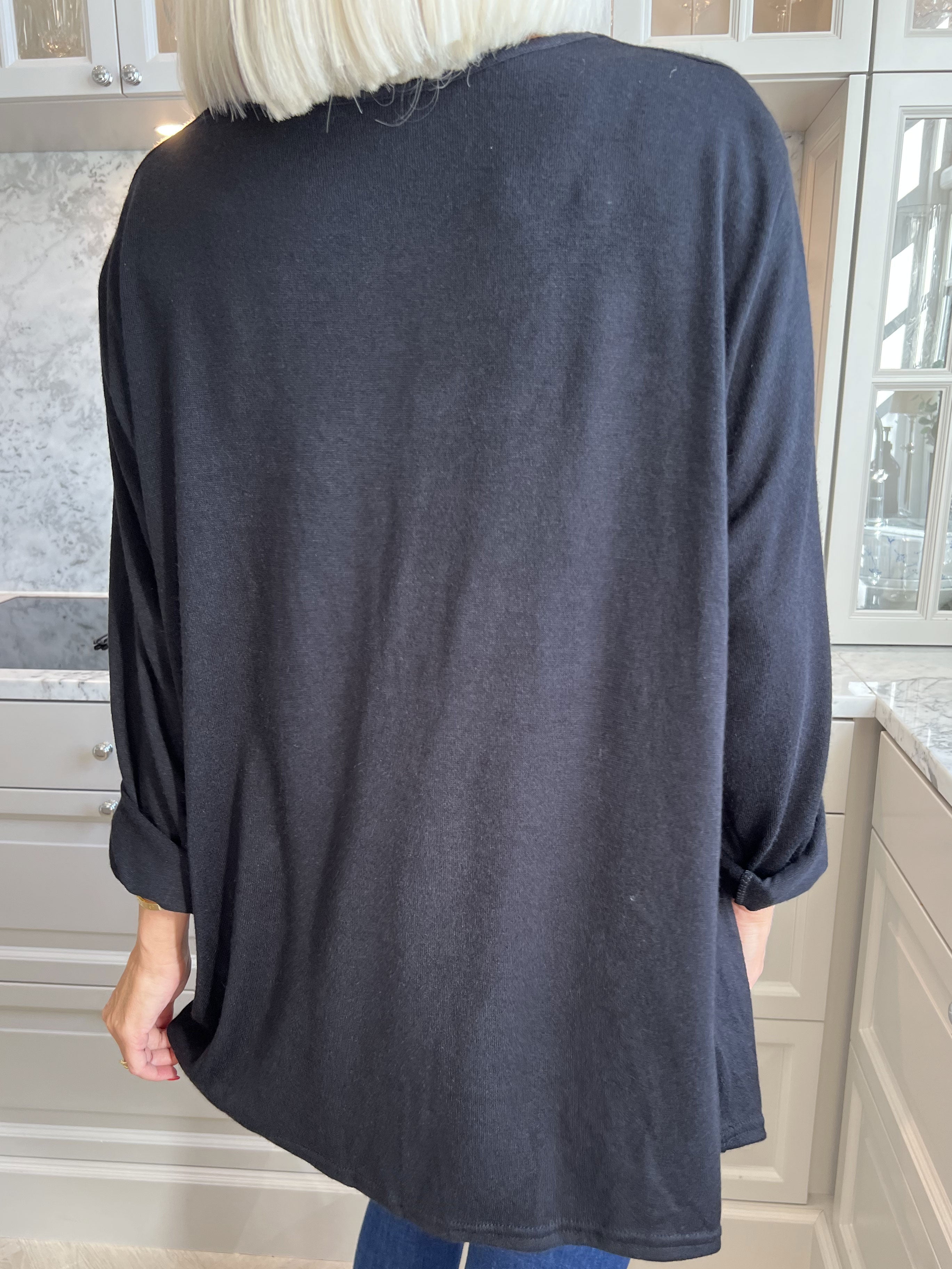 Linn - Mjuk blus med knut på bröstet